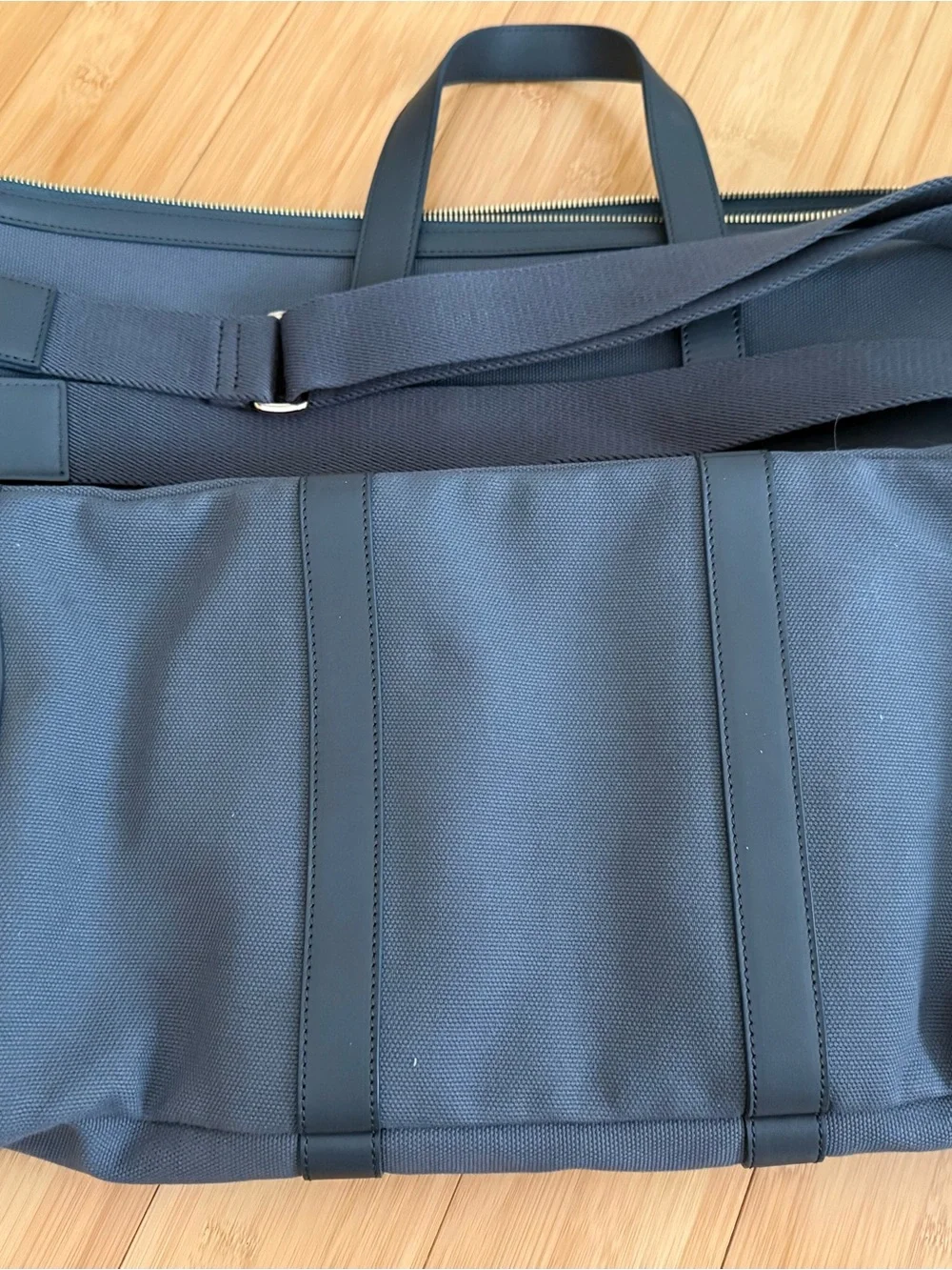 Brand new Hennessy Gray Canvas Duffel Bag with Leather Trim